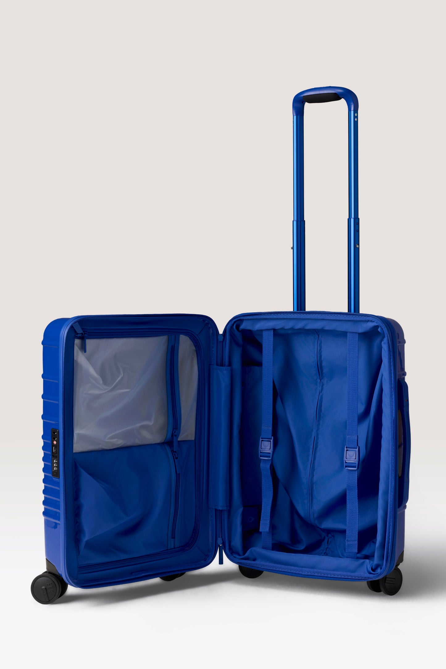 The Carry-On Roller in Glossy Cobalt Blue