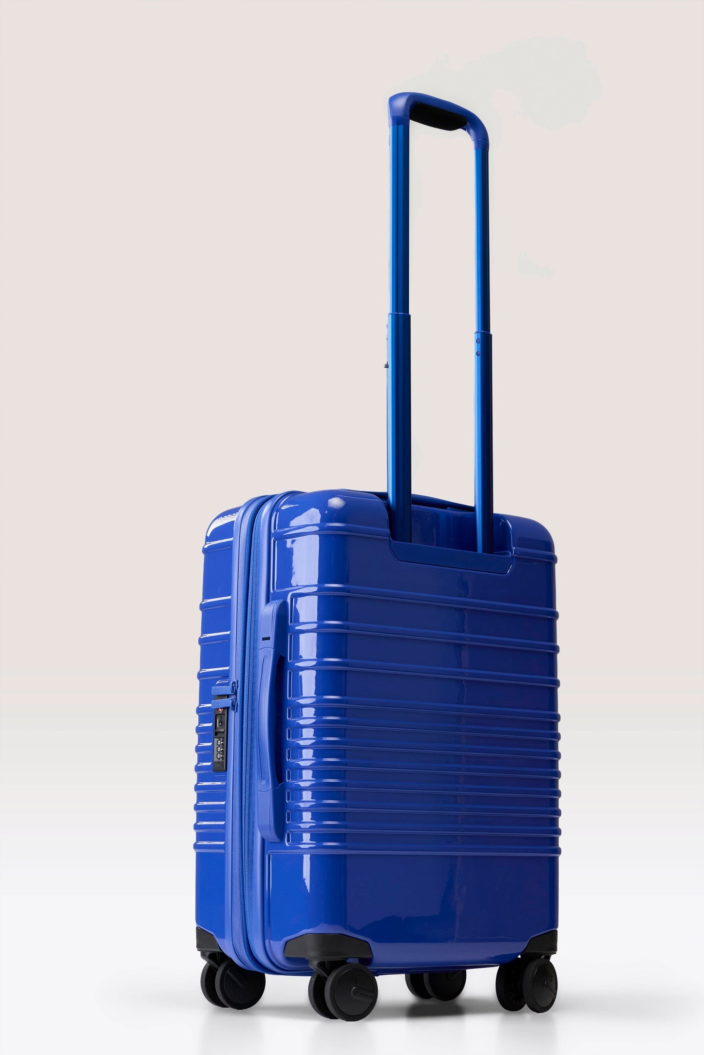 The Carry-On Roller in Glossy Cobalt Blue