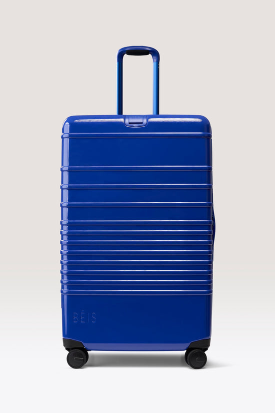The Large Check-In Roller in Glossy Cobalt Blue