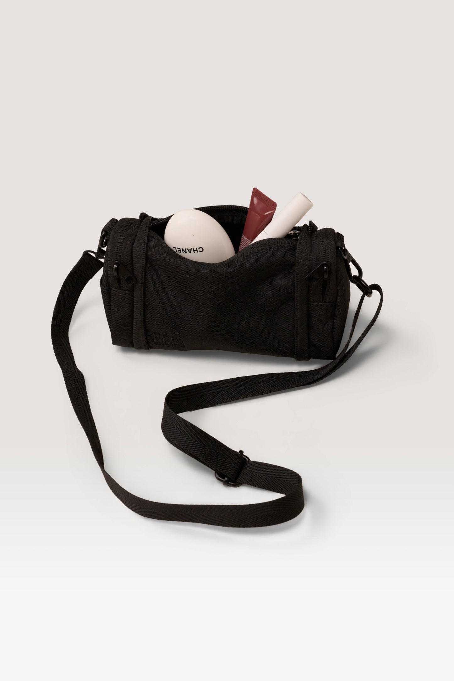 The Expandable Crossbody Charm in Black