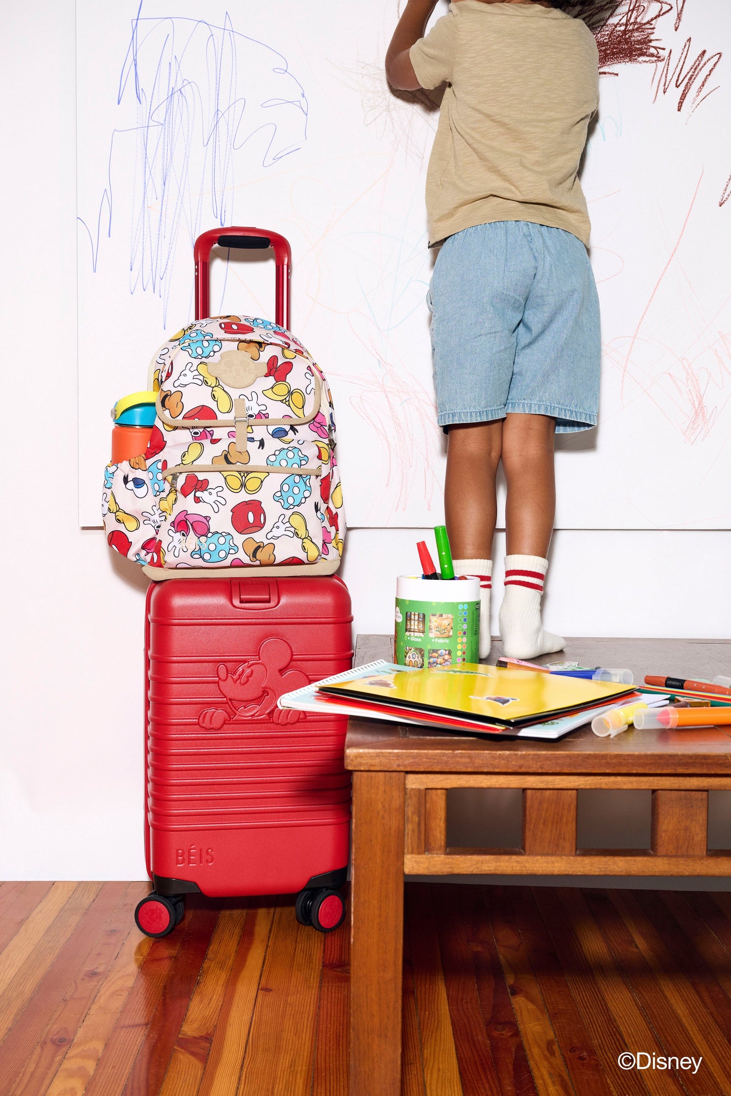 The Disney Small Carry-On Roller in Mickey Mouse Red