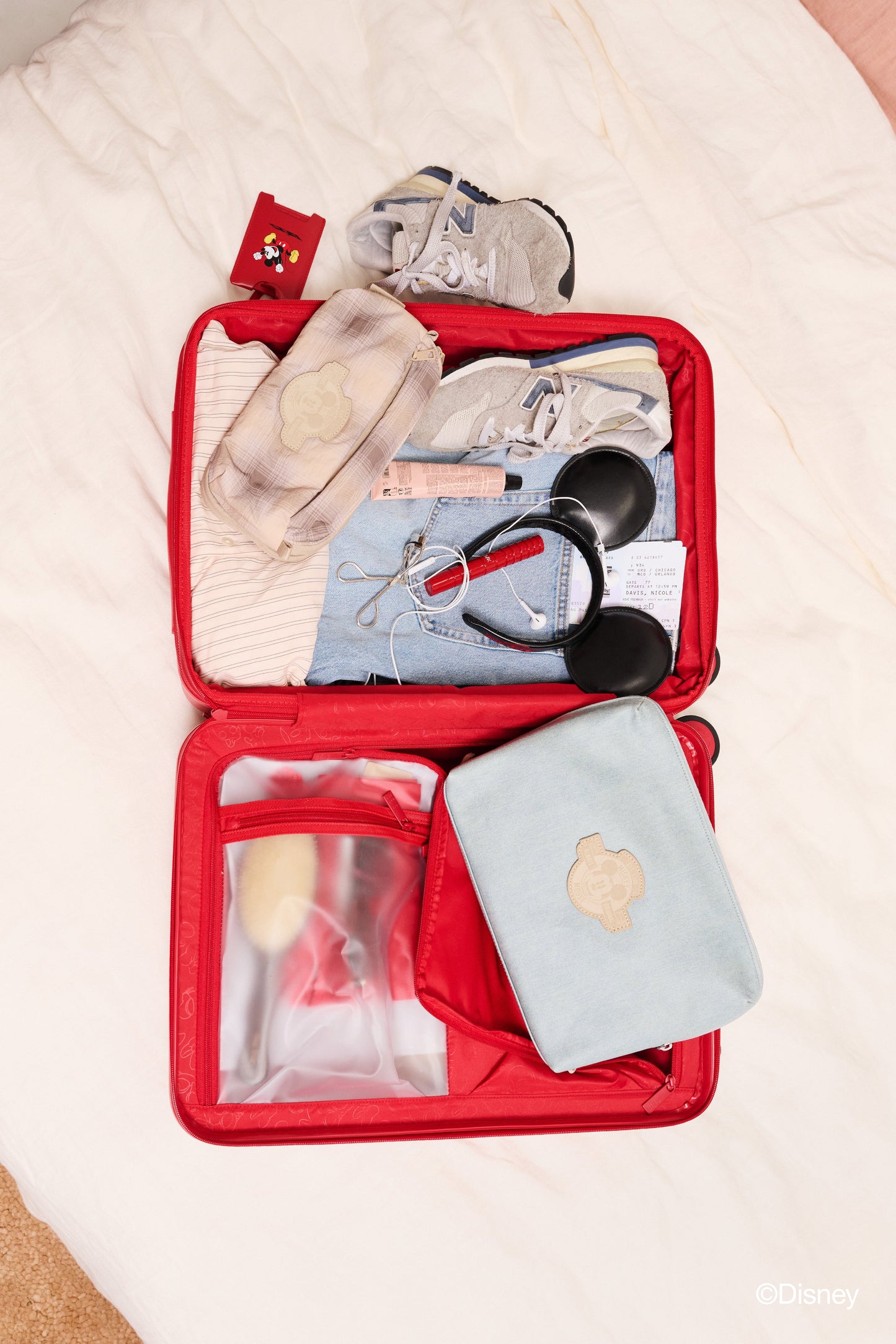 The Disney Carry-On Roller in Mickey Mouse Red