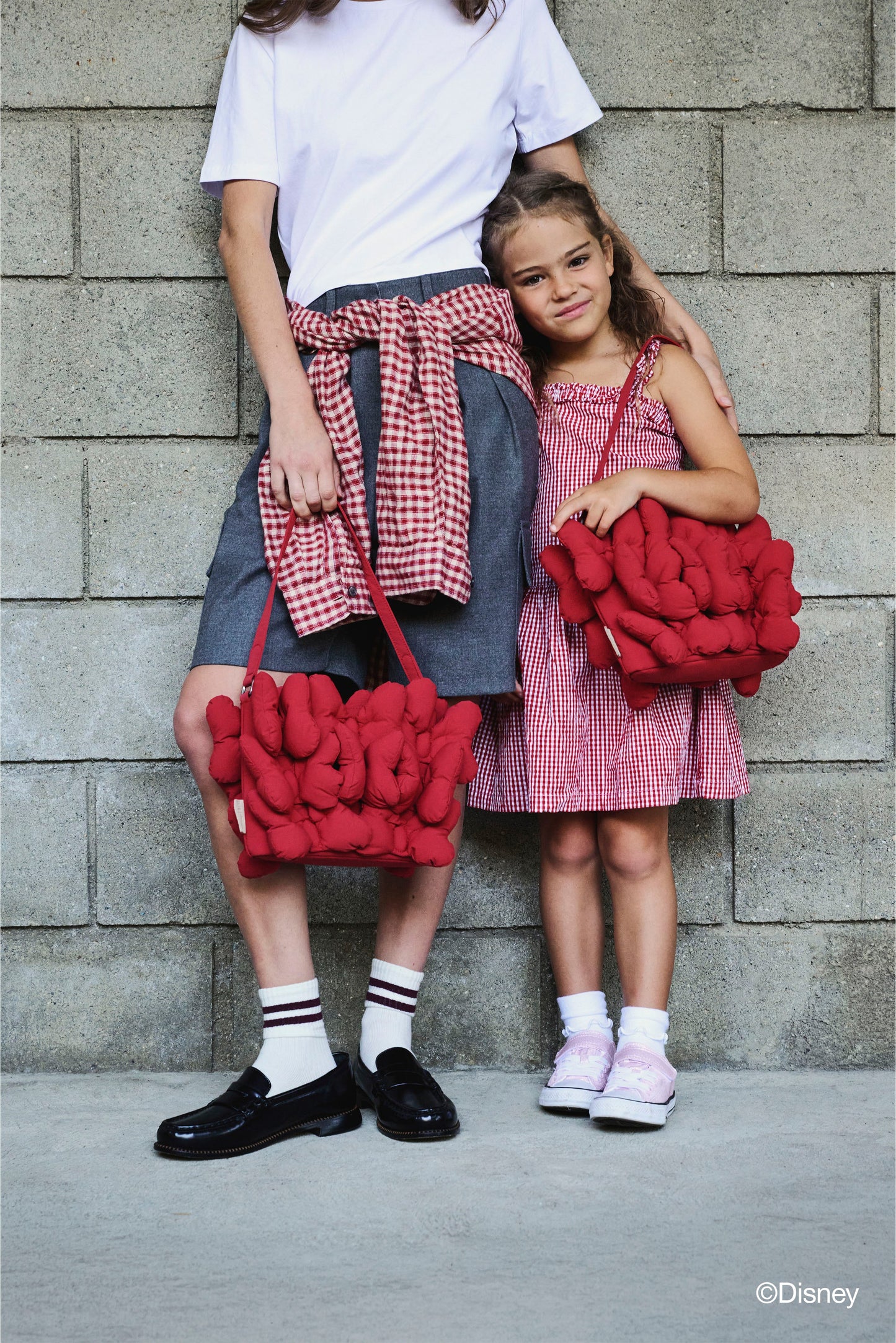 The Minnie Bow Handbag in Mickey Mouse Red
