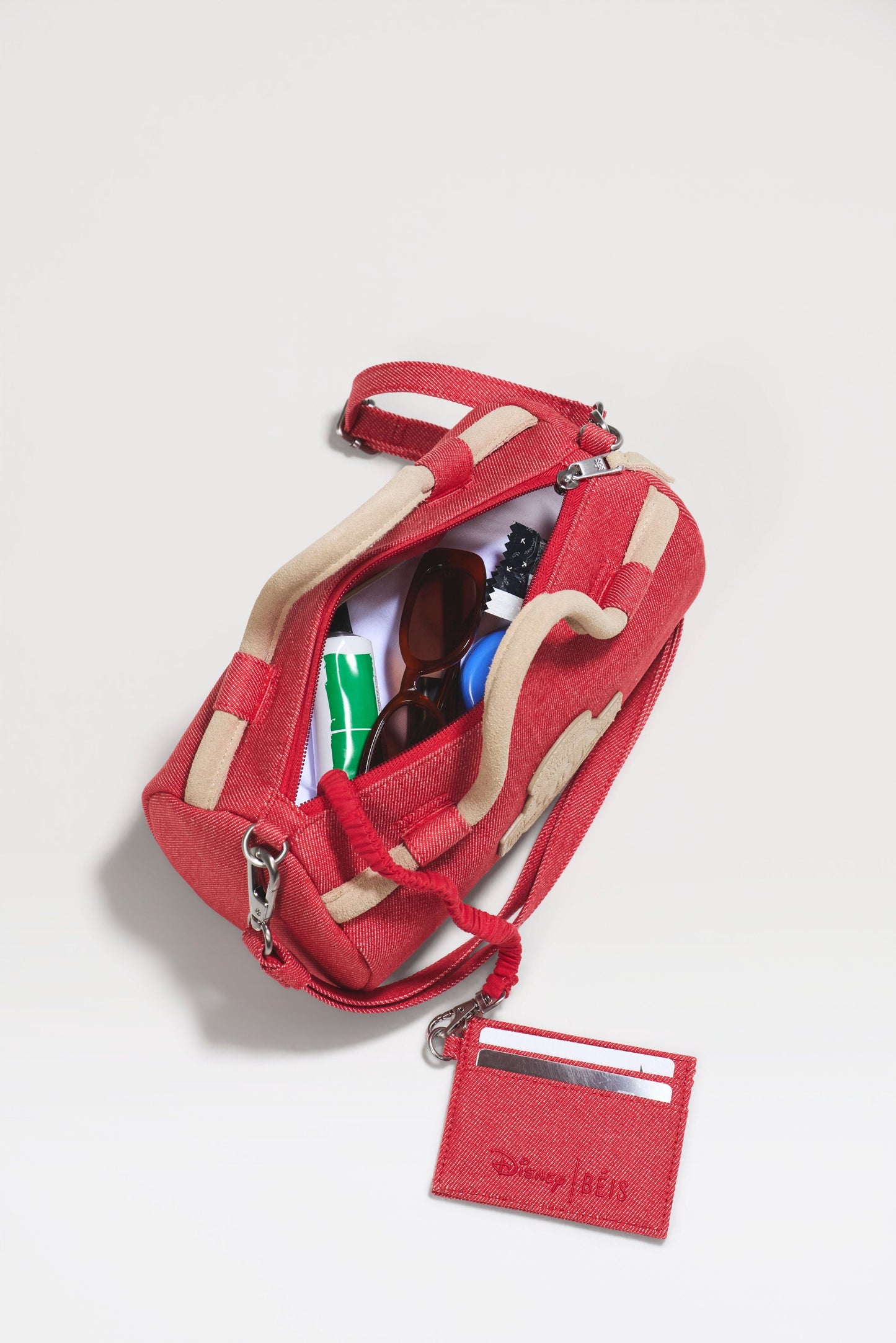 The Disney Small Duffle in Red Jeans