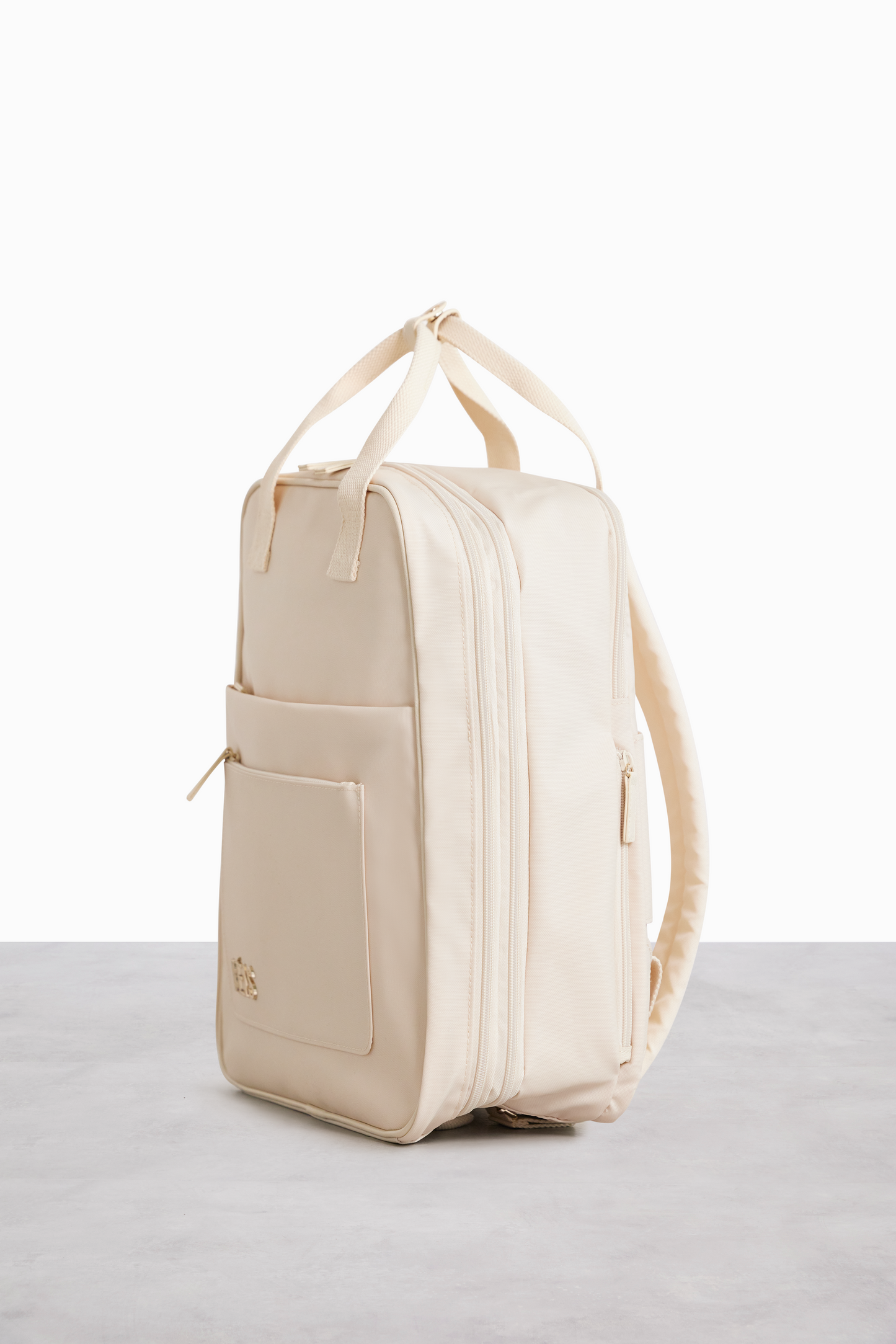 Resale The Expandable Backpack in Beige