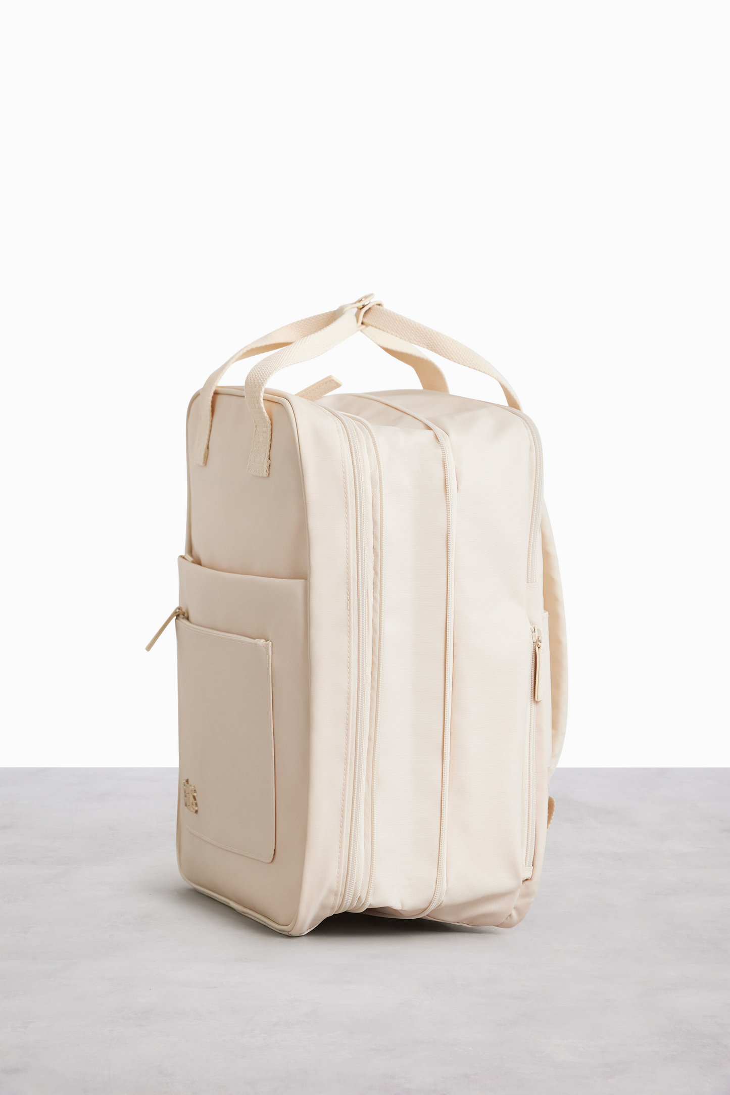 Resale The Expandable Backpack in Beige