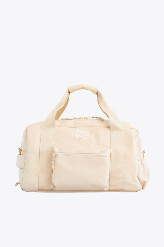 Le sac de sport en beige