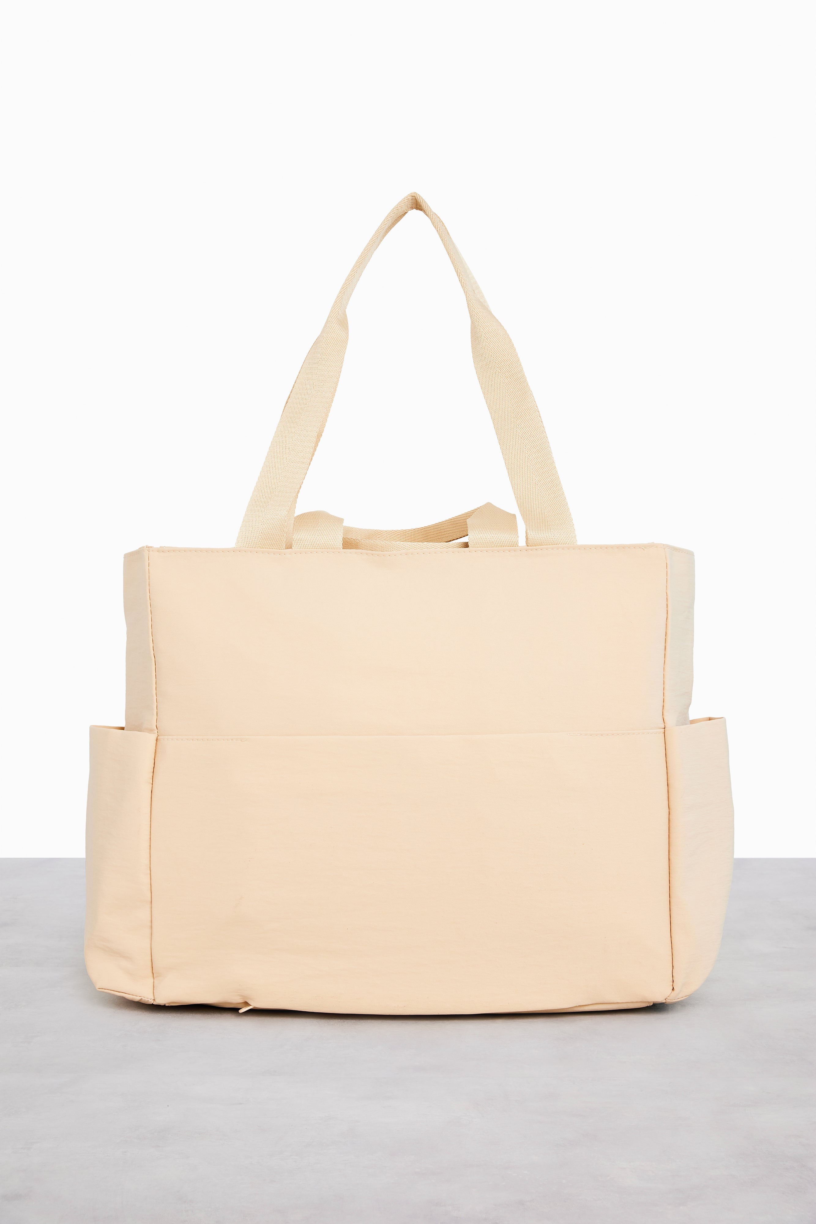 Le sac de sport en beige