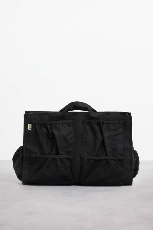 The Changing Organizer in Black